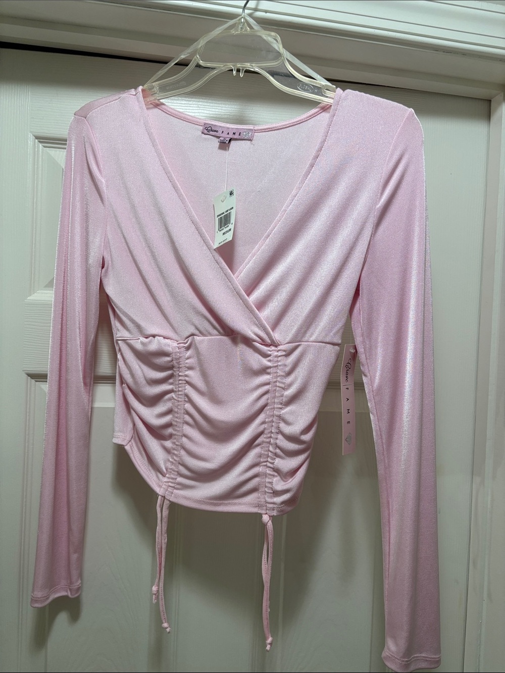 Crave Fame Light Pink V-neck Ruched Wrap Long Sleeve Top